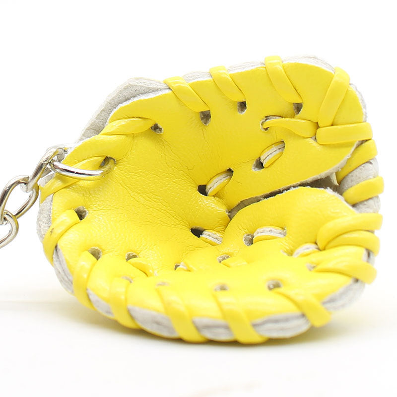 Baseball glove charm on backpack