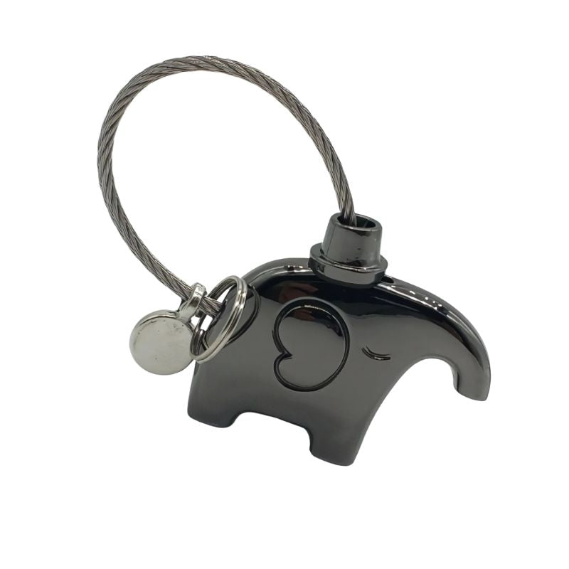 Black keychain with heart design on a white background