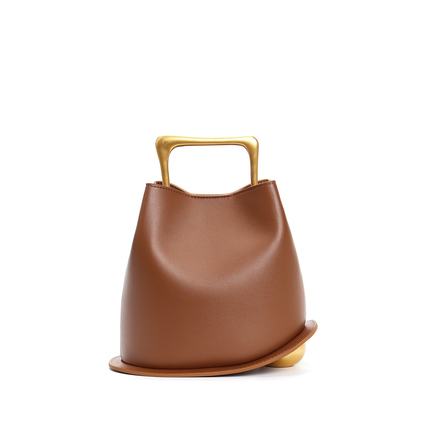 Brown leather handbag with gold handle and trim on a white background