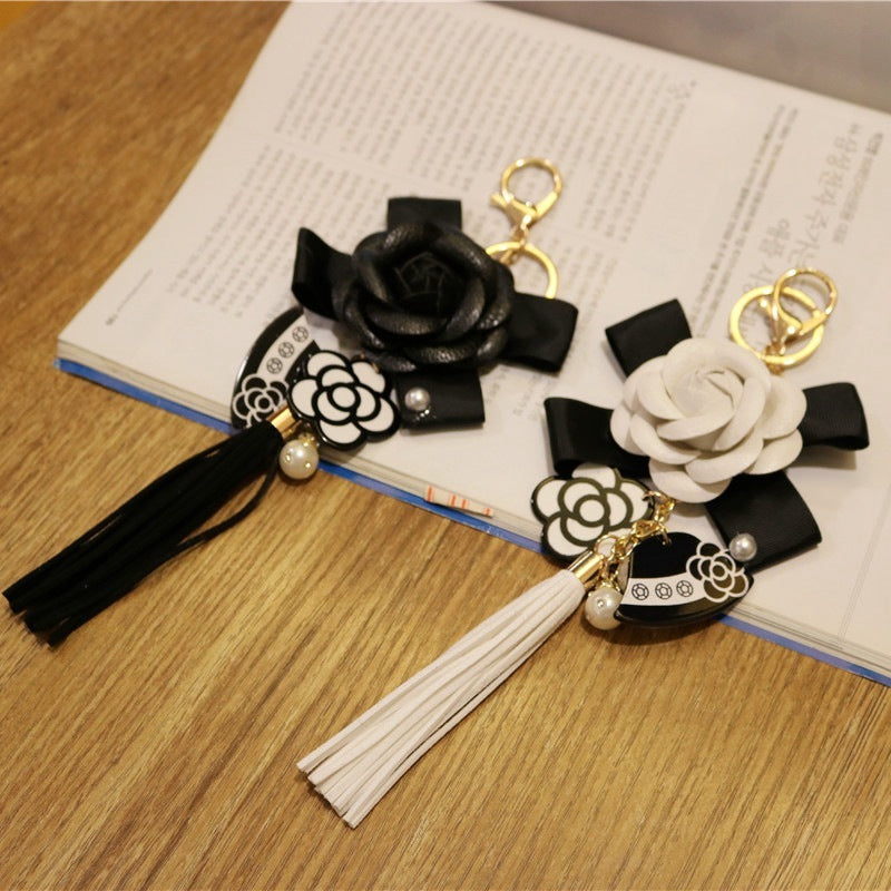 Camellia flower leather bag charm