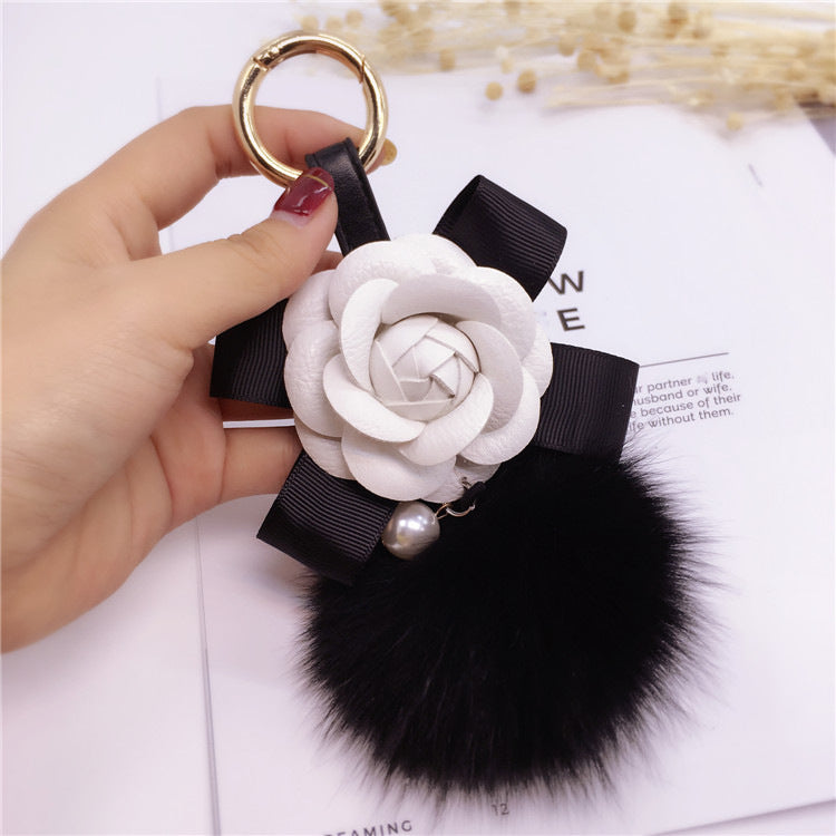 Cute plush hair ball keychain by LuxeBlackBag