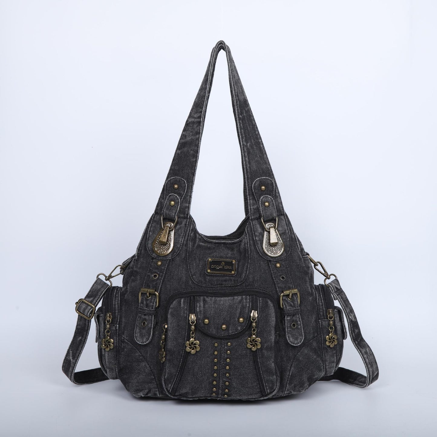 Denim handbag with decorative elements on a light gray background