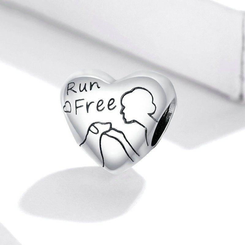Handmade heart-shaped bead in oxidized silver