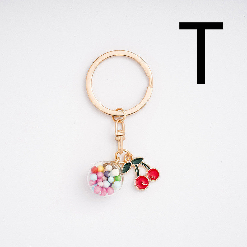 Keychain with colorful charm on a white background
