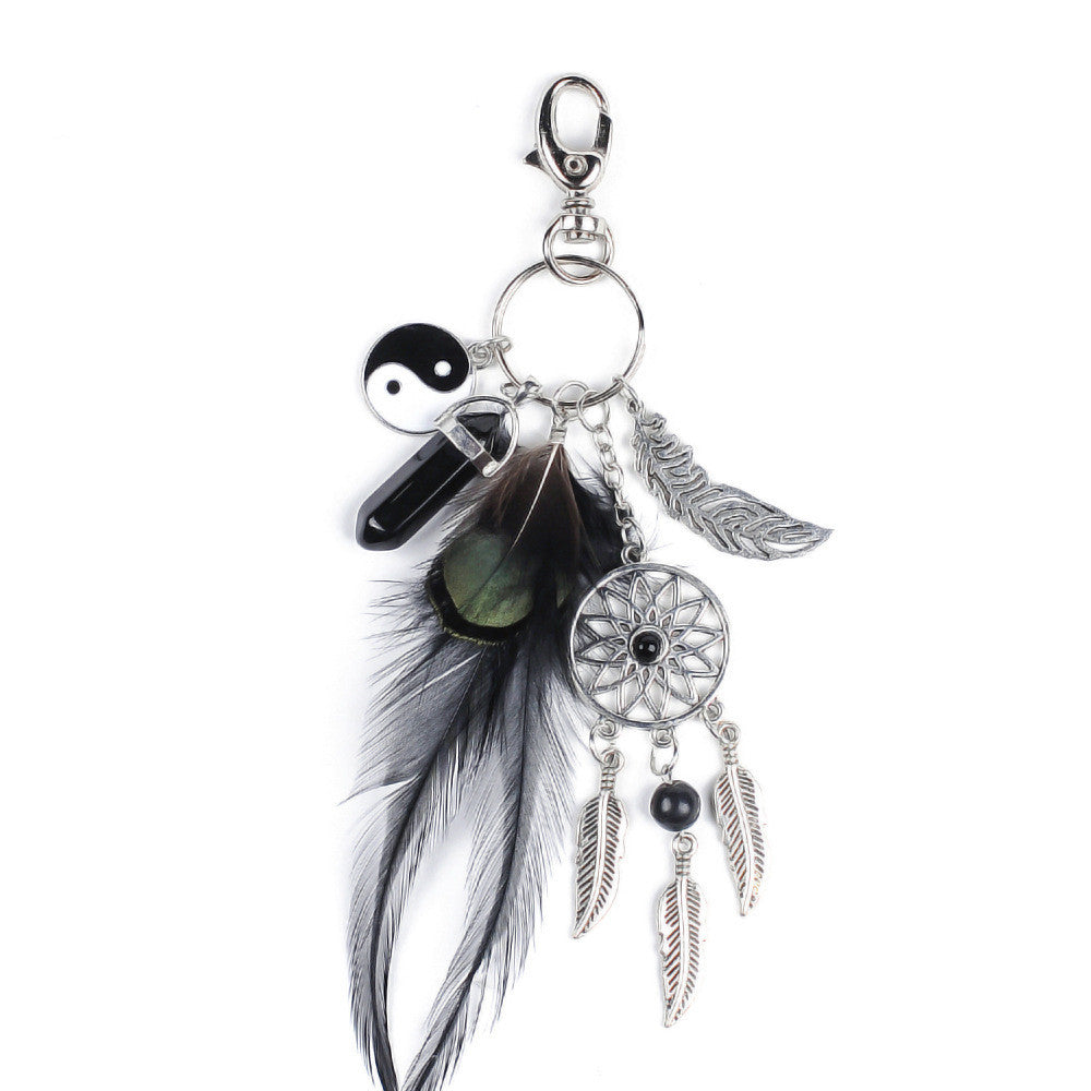 Keychain with feathers, beads, and a dreamcatcher design