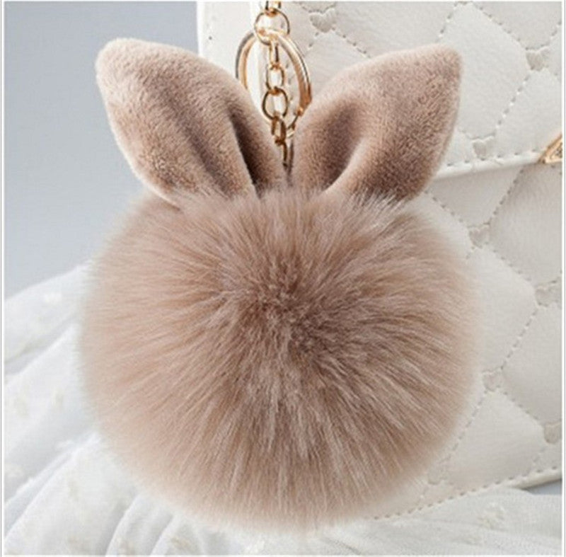 Khaki bunny key pendant close-up