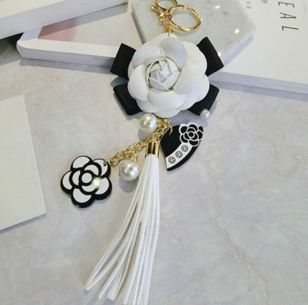 LuxeBlackBag camellia bag accessory