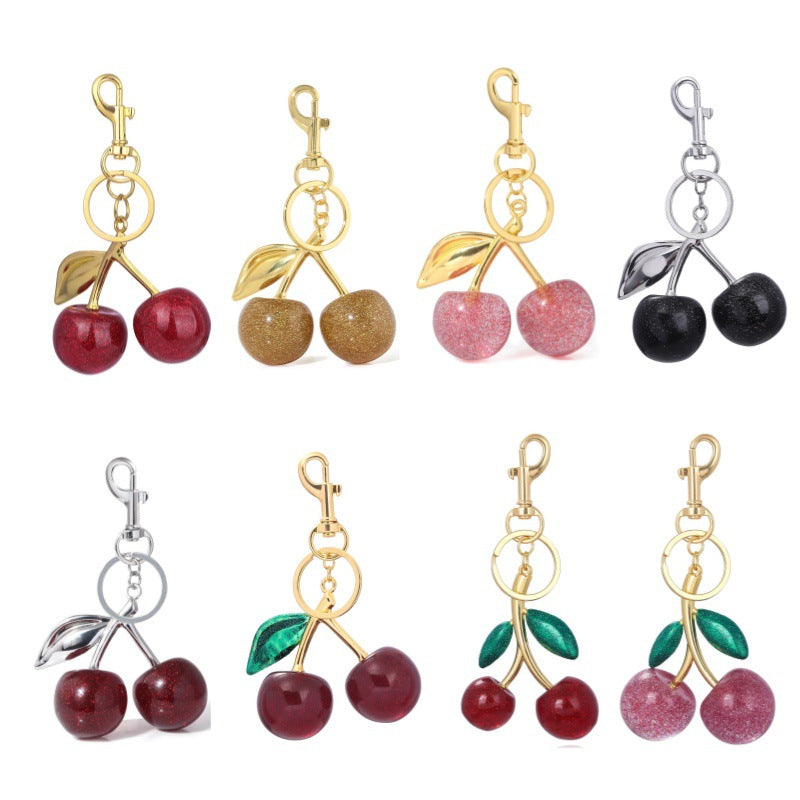 LuxeBlackBag cherry keychain close-up