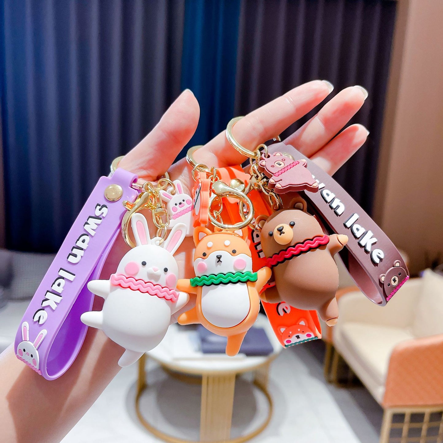 LuxeBlackBag dancing white rabbit keychain
