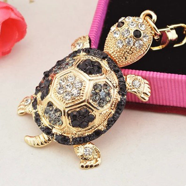 LuxeBlackBag sparkly tortoise pendant