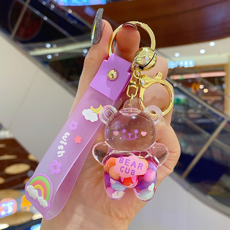Playful oil bear keyring in multiple colors