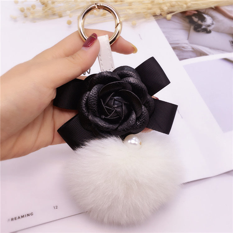 Plush bow bag charm in Korean pink