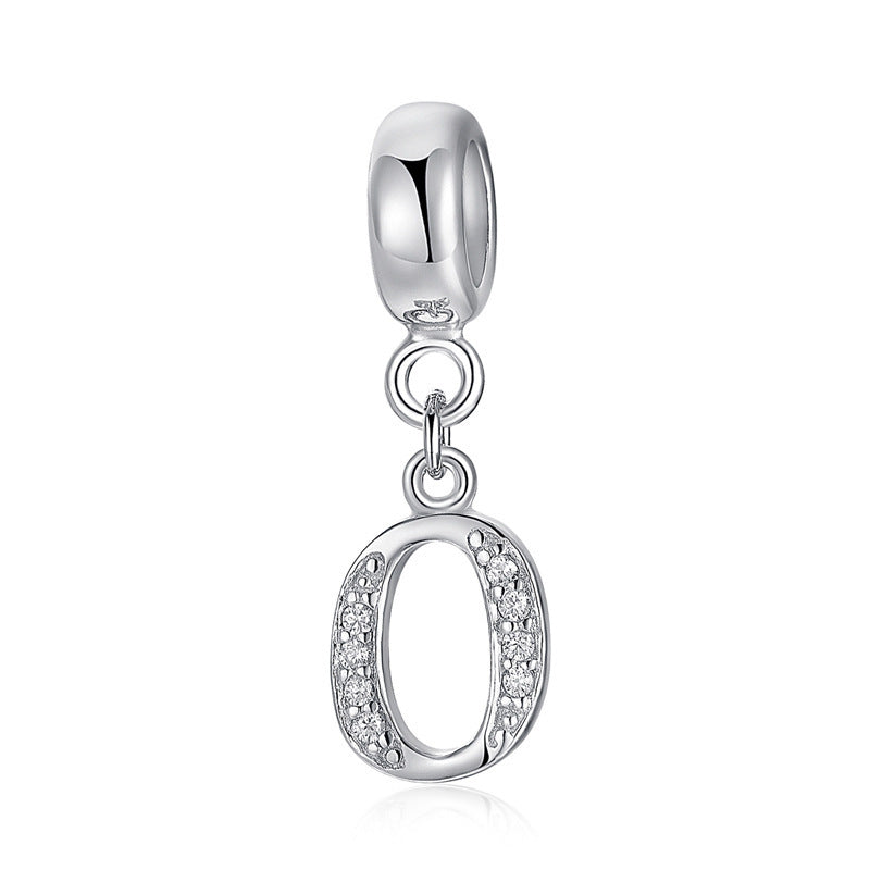 Silver charm with letter O