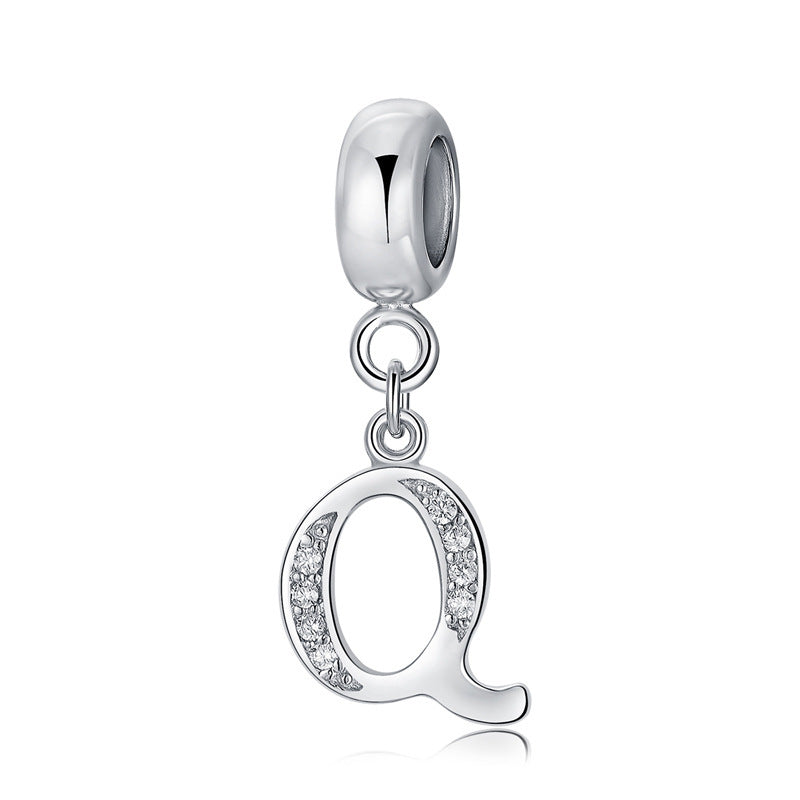 Silver charm with letter Q