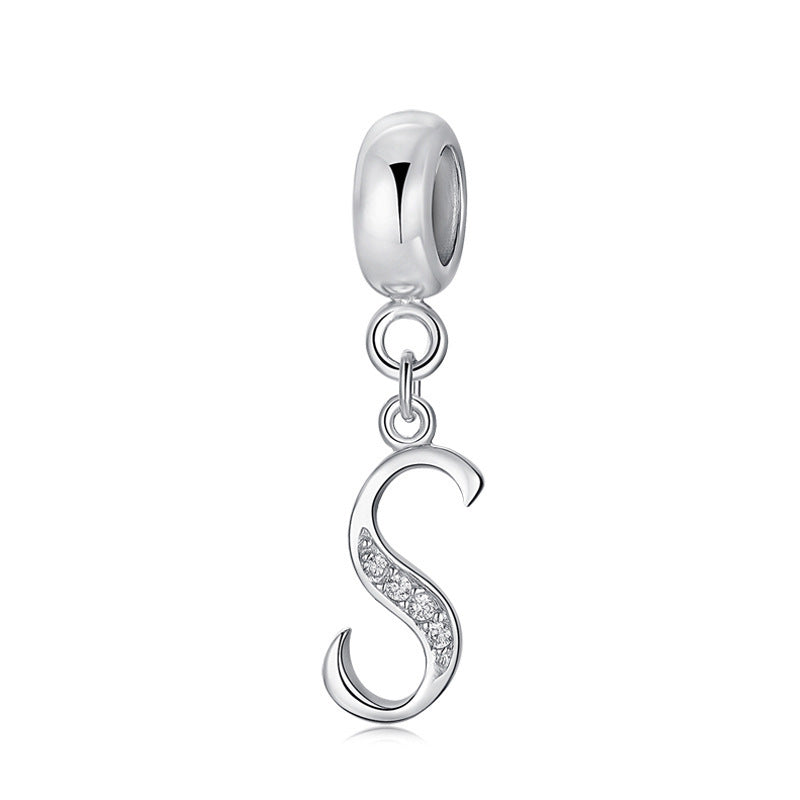 Silver charm with letter S