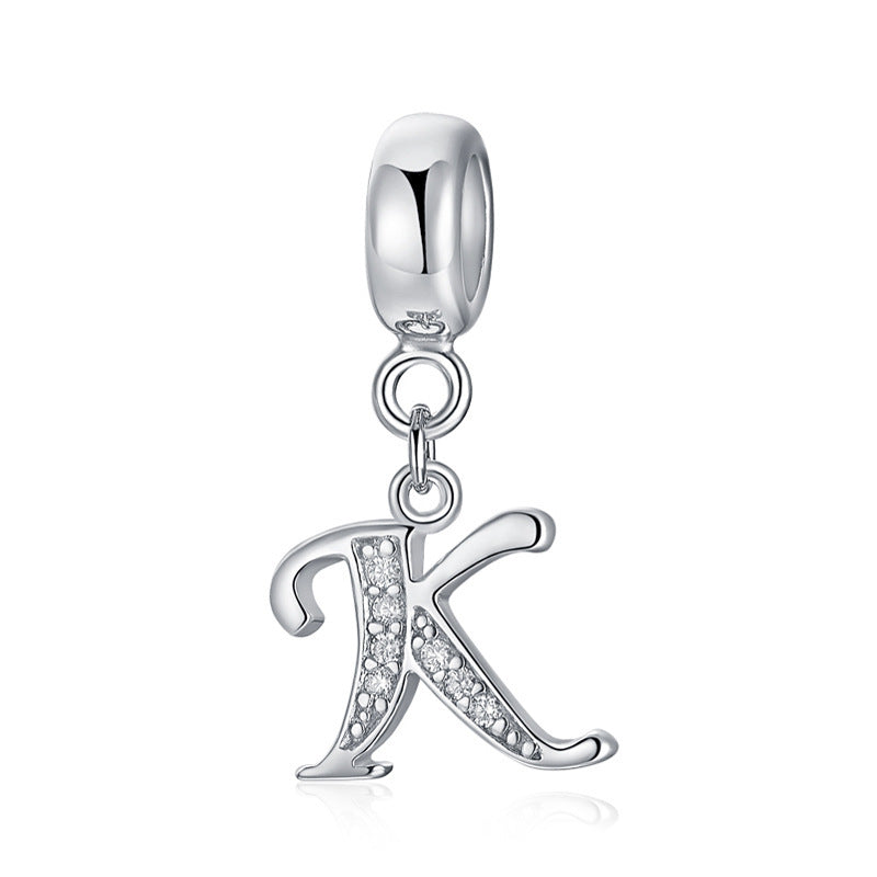 Silver pendant with letter K