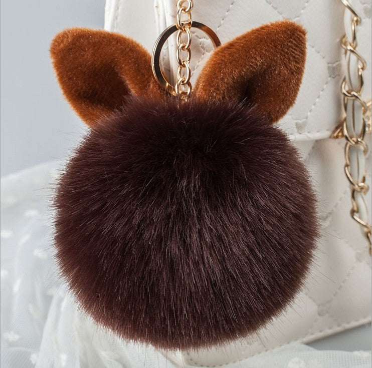 Soft fur keychain in navy blue