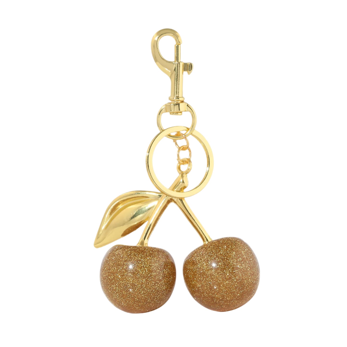 Women's cherry bag charm in hand