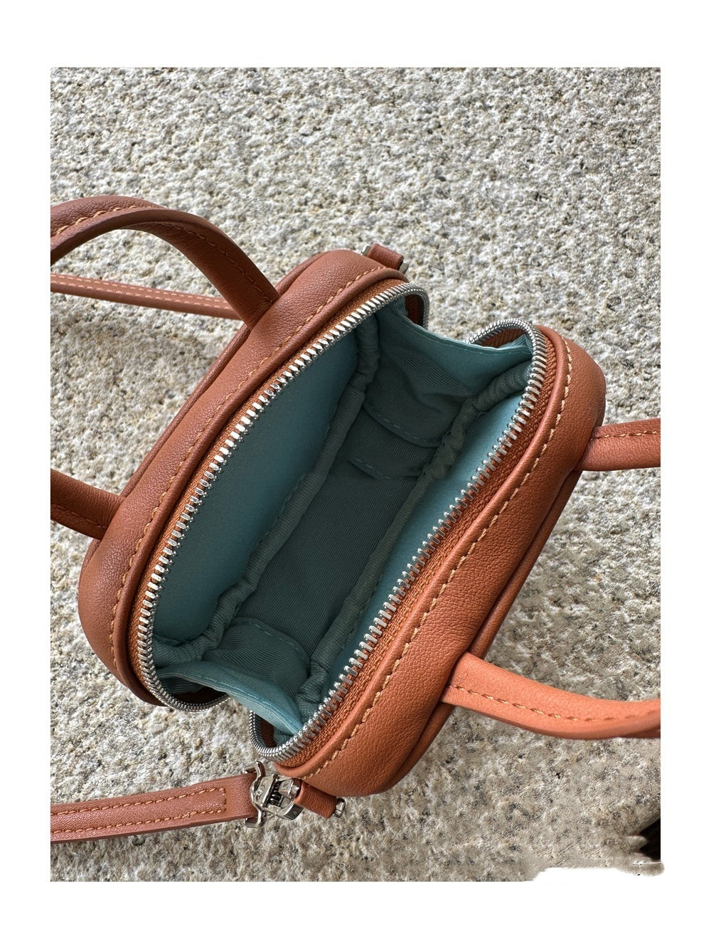 Ancora red leather mini waist bag with pendant
