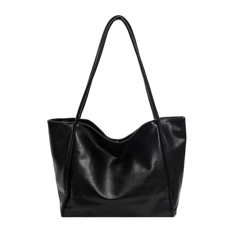 Black PU leather shoulder bag for short-distance travel
