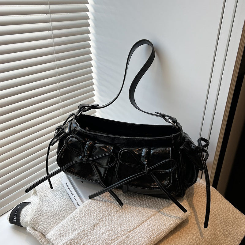 black pleated PU handbag with bow and tassel