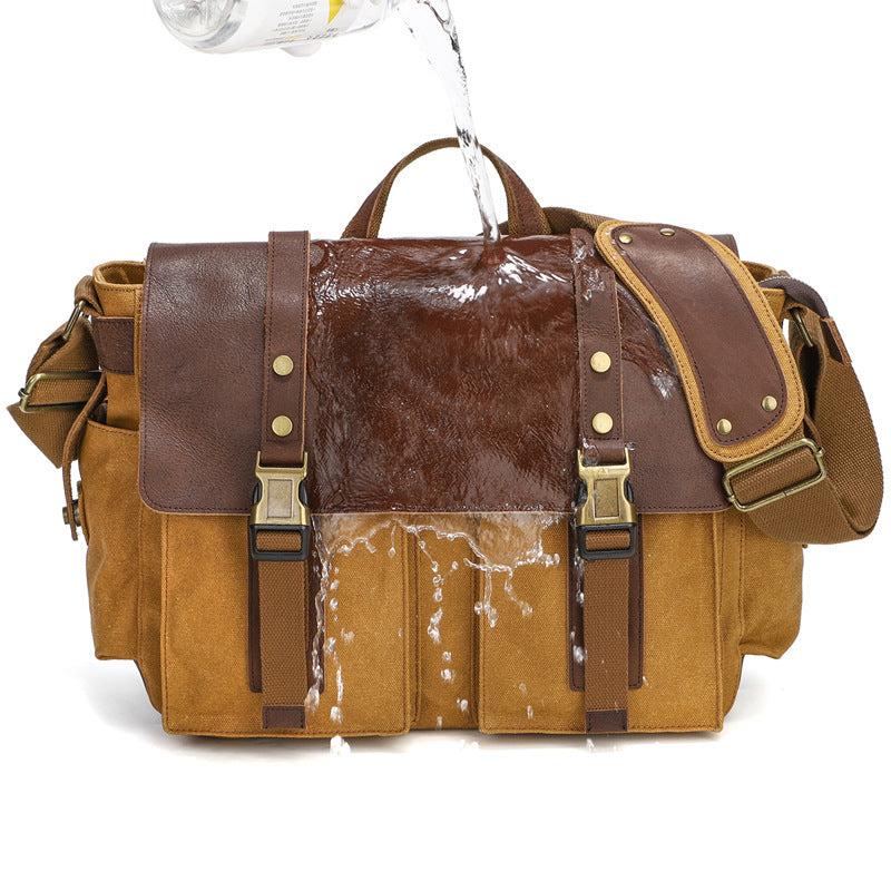 Black waxed canvas men’s crossbody bag styled for casual wear