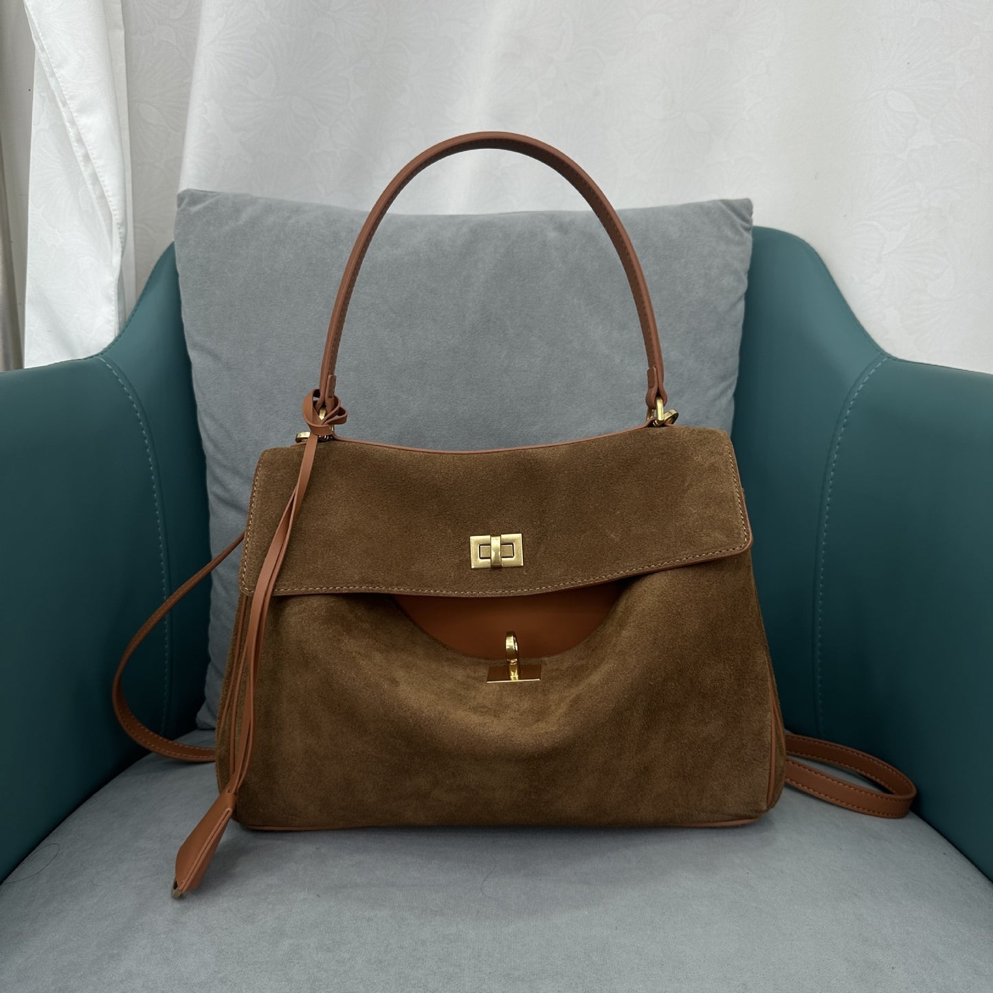 Brown 35cm woven leather shoulder bag front angle