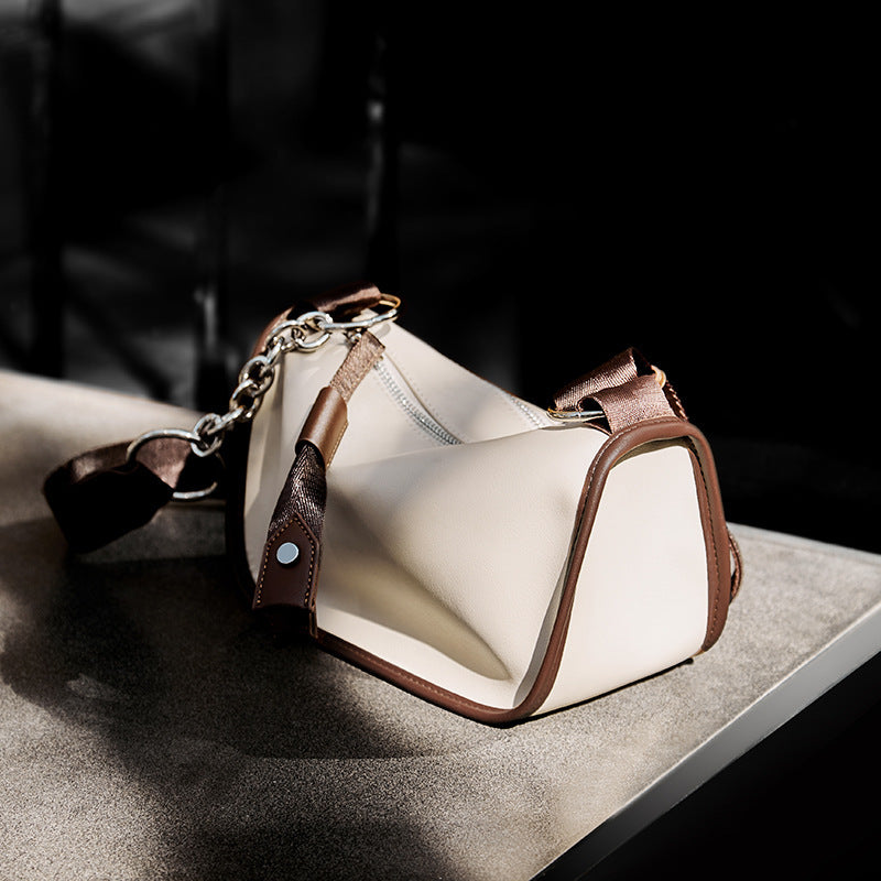 Close-up of caramel leather with stitching detail