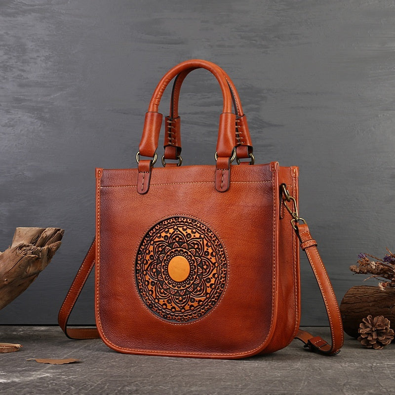 Brown embossed cowhide Chinese-style shoulder handbag