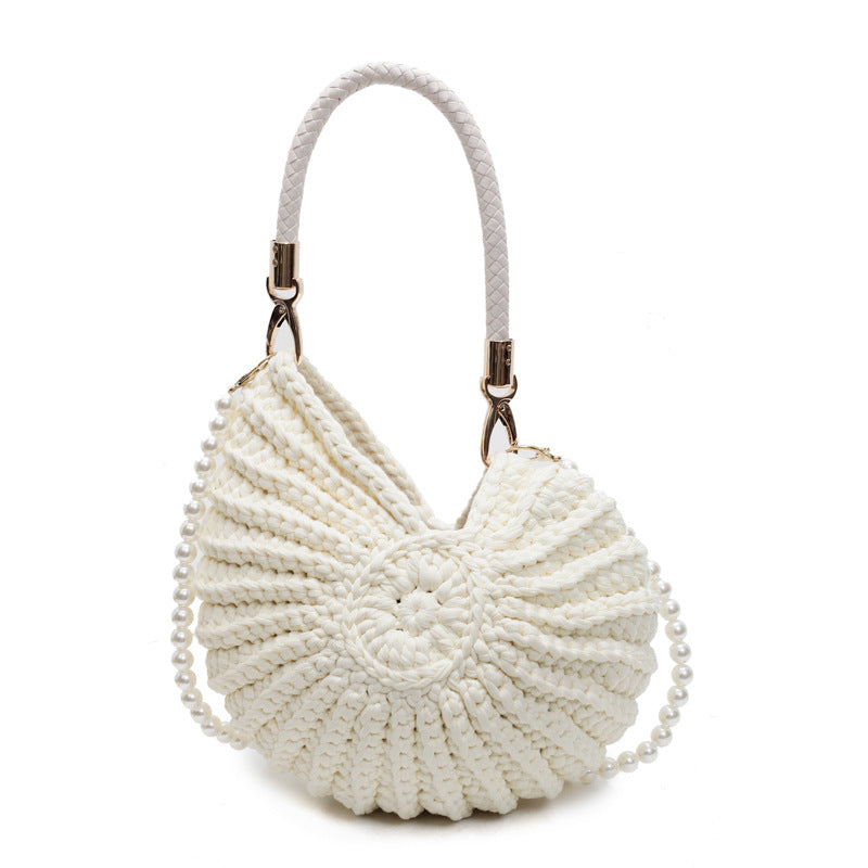Coffee color handmade woven shoulder bag in shell shape