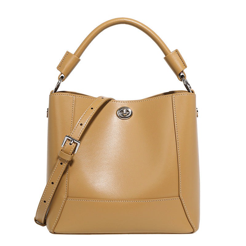 Compact soft leather shoulder bag with cotton lining