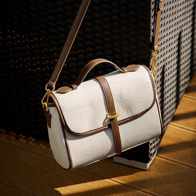 Side view of contrast color leather shoulder purse