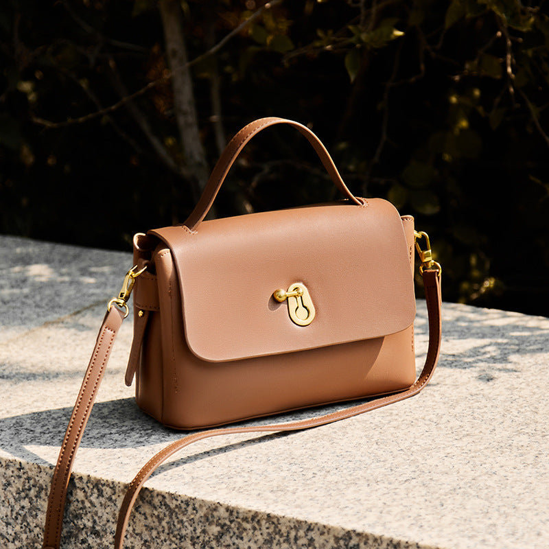 Contrast stitching design on soft leather shoulder bag
