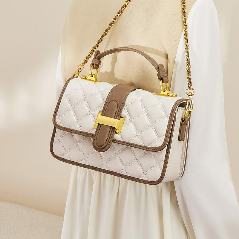 Front view of small autumn cowhide crossbody handbag