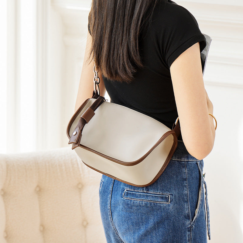 Interior compartments including phone and zipper pouch
