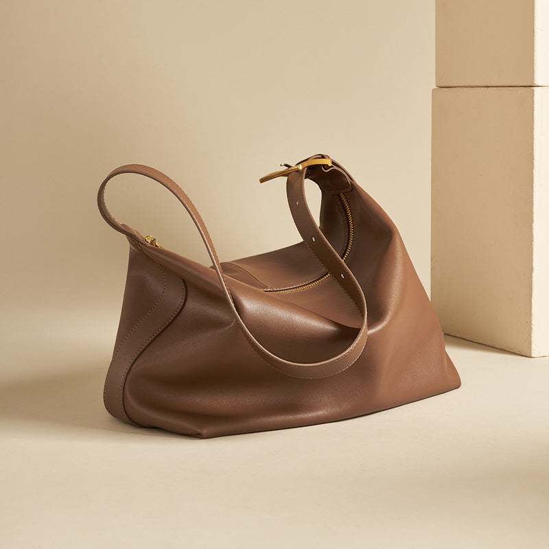 Close-up of adjustable strap on crossbody tote