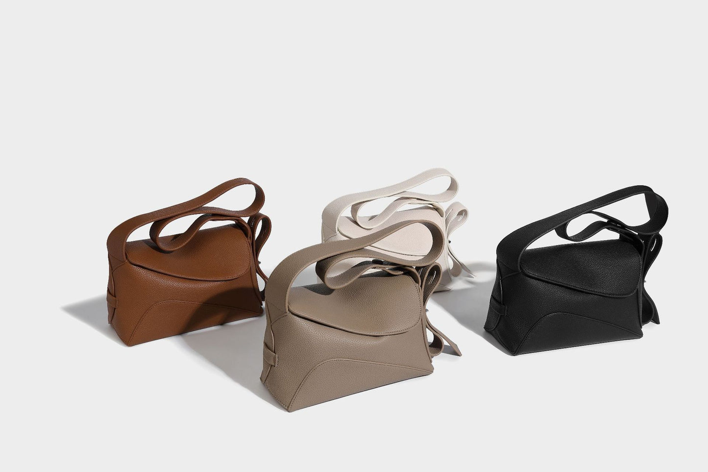 Woman styling cowhide leather tote in casual outfit
