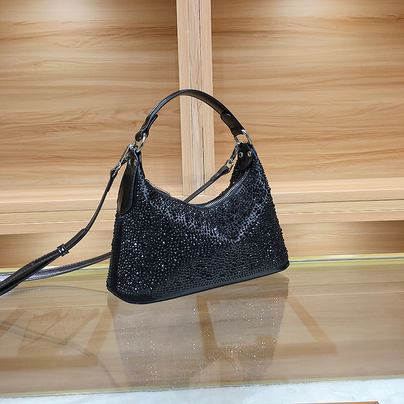Dumpling-style glitter handbag with top handle design