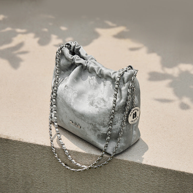 Fall/winter fashion outfit with cowhide chain purse