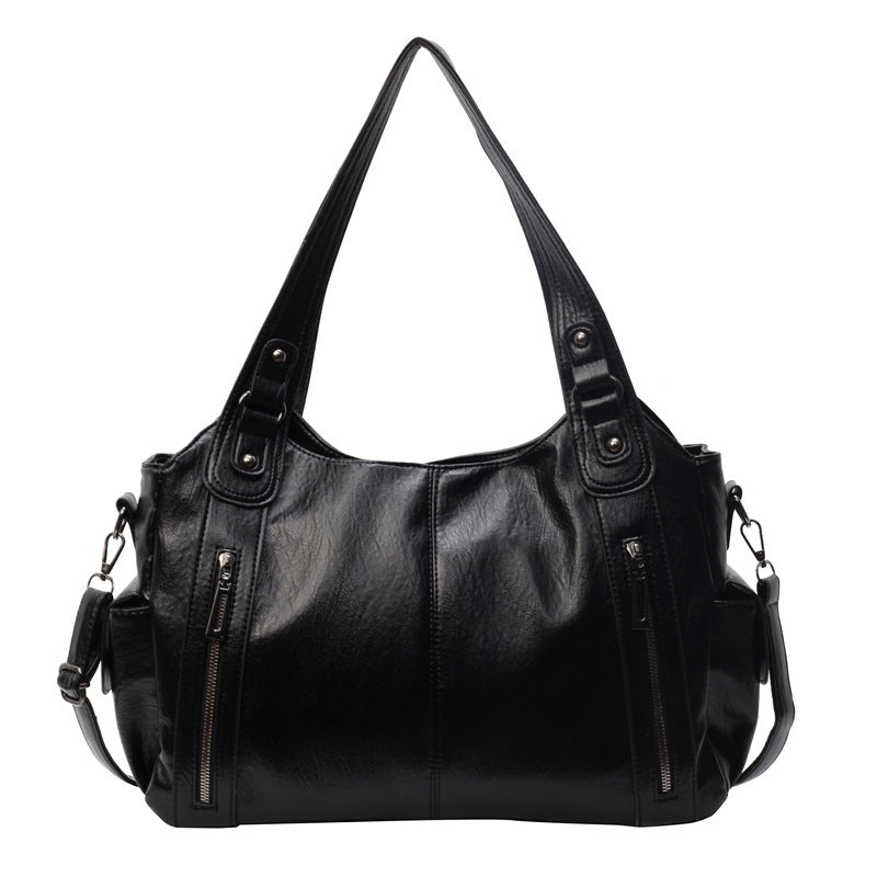 Shoulder handbag with soft material and large space