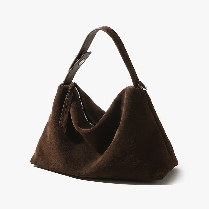 Brown handbag on a white background