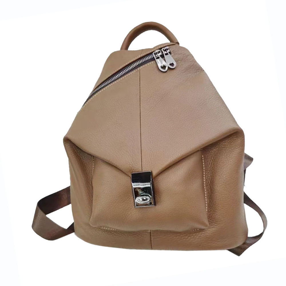 Gray leather backpack with visible stitching and modern structure