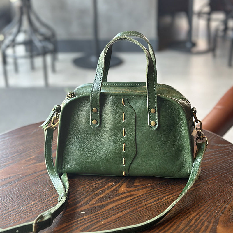 Green cowhide shoulder bag in retro style with 3D outer pocket
