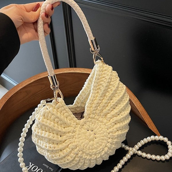Milky white handmade woven tote bag in shell shape with double straps