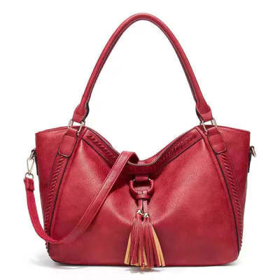 PU leather crossbody tote bag styled with casual modern outfit