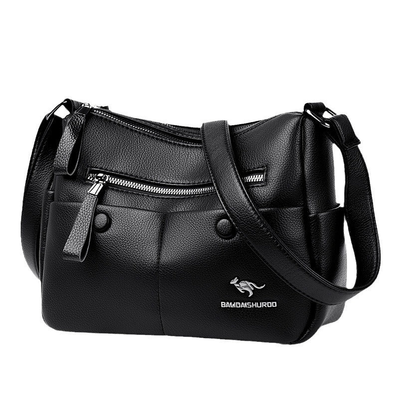 Interior of PU leather shoulder bag with multiple compartments