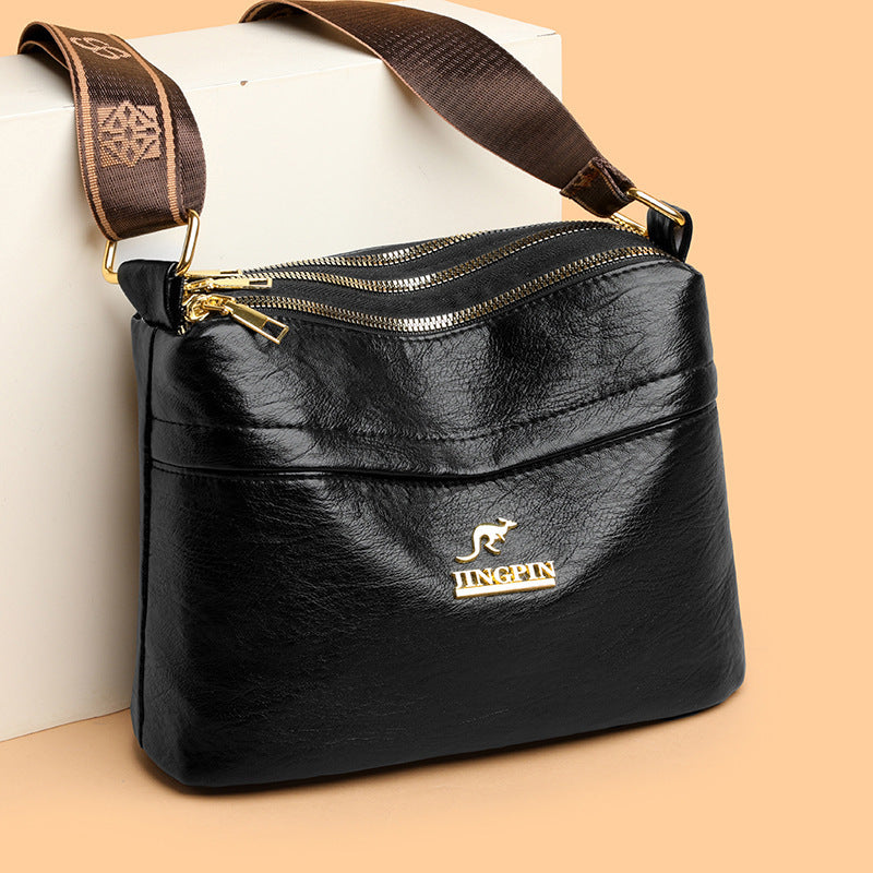 Woman wearing casual PU leather crossbody bag in lifestyle setting