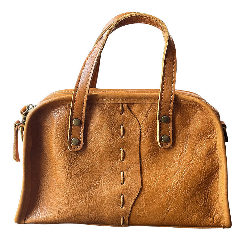 Side view of lightweight cow leather shoulder bag for women