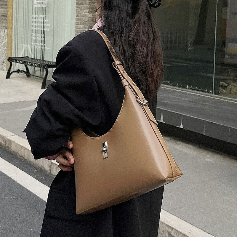 Apricot soft leather shoulder bag in dumpling shape