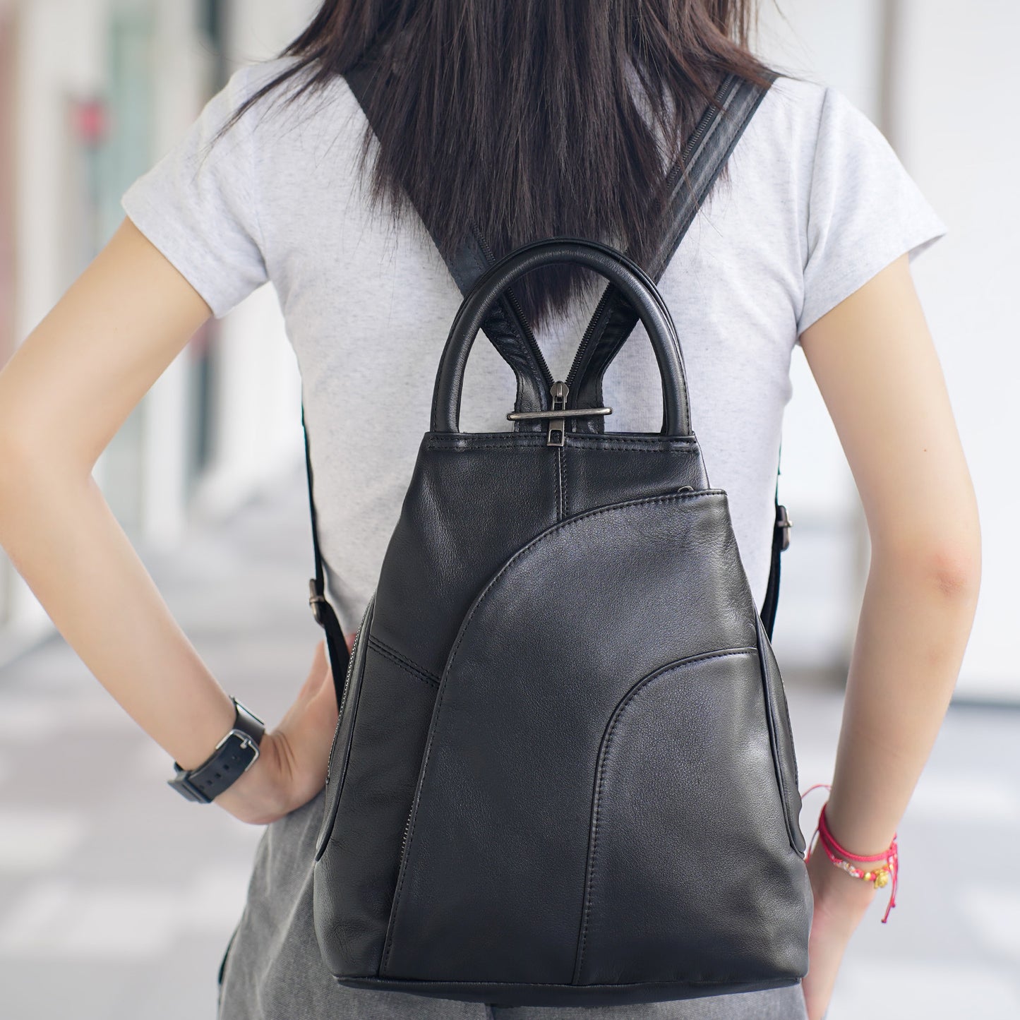 Black genuine cowhide women’s backpack with large capacity